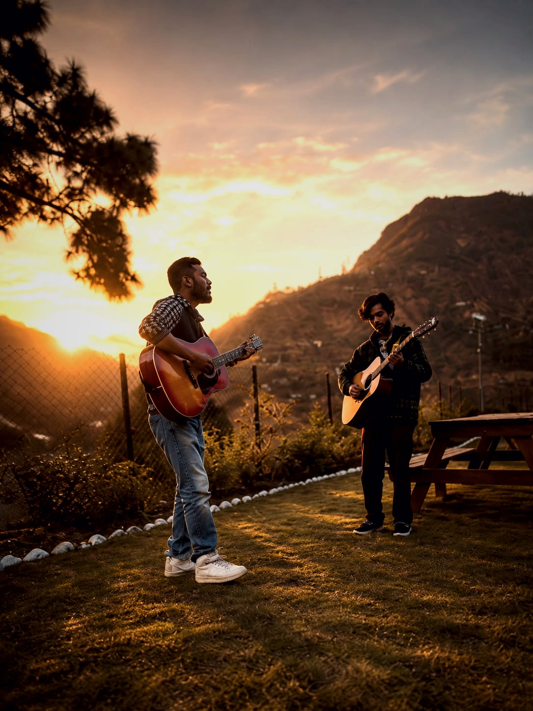 Duo performing music outdoors